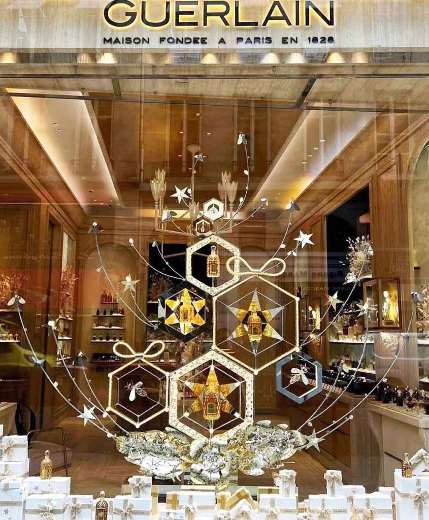 Guerlain shop design with high-end stainless steel display props