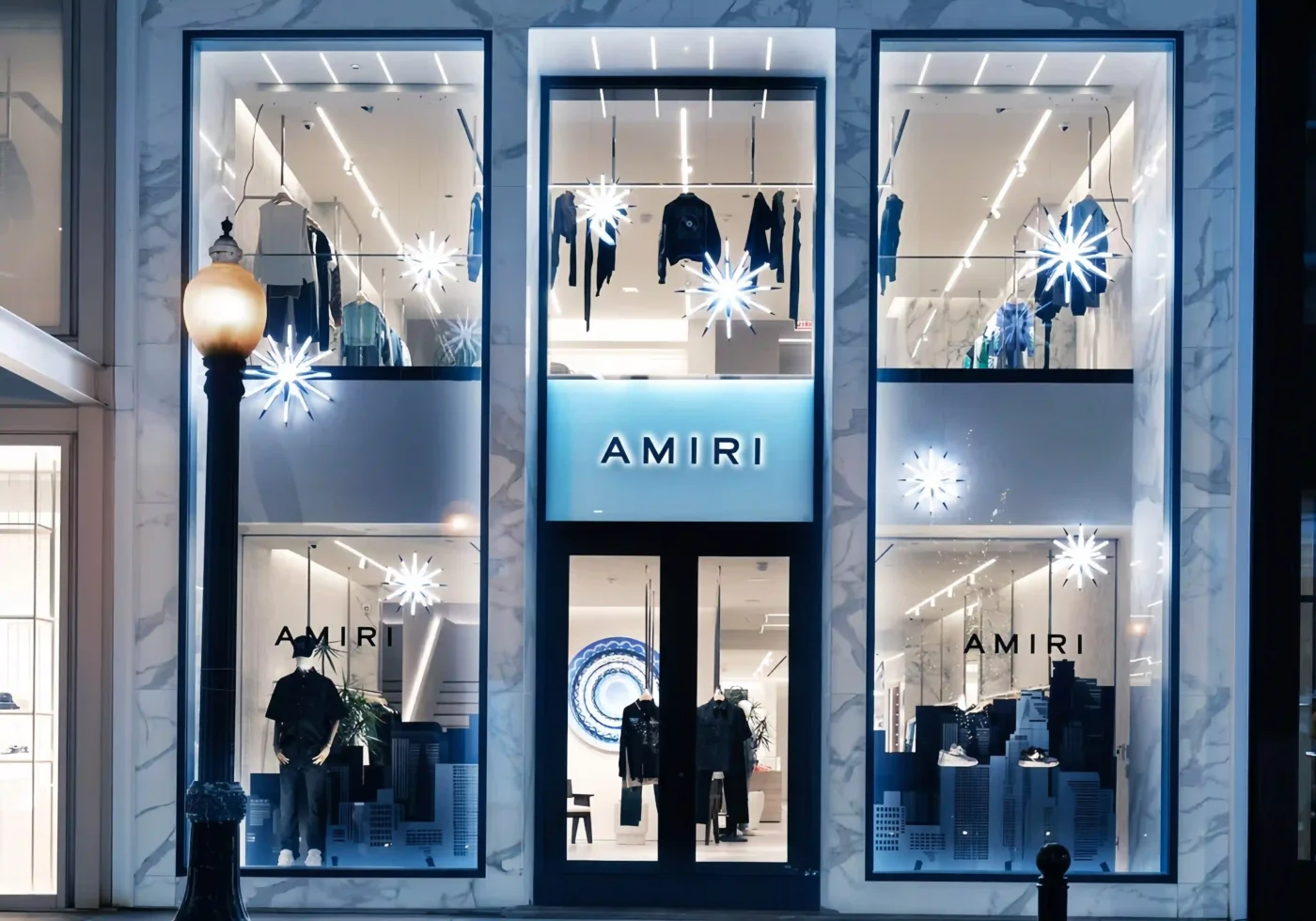 AMIRI acrylic window display visual merchandising scaled
