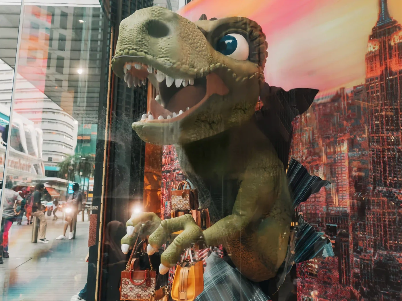 Creative coach retail window design with FRP dragon sculpture scaled