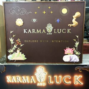 custom window display backdrop with wood canvas frame and LED logo