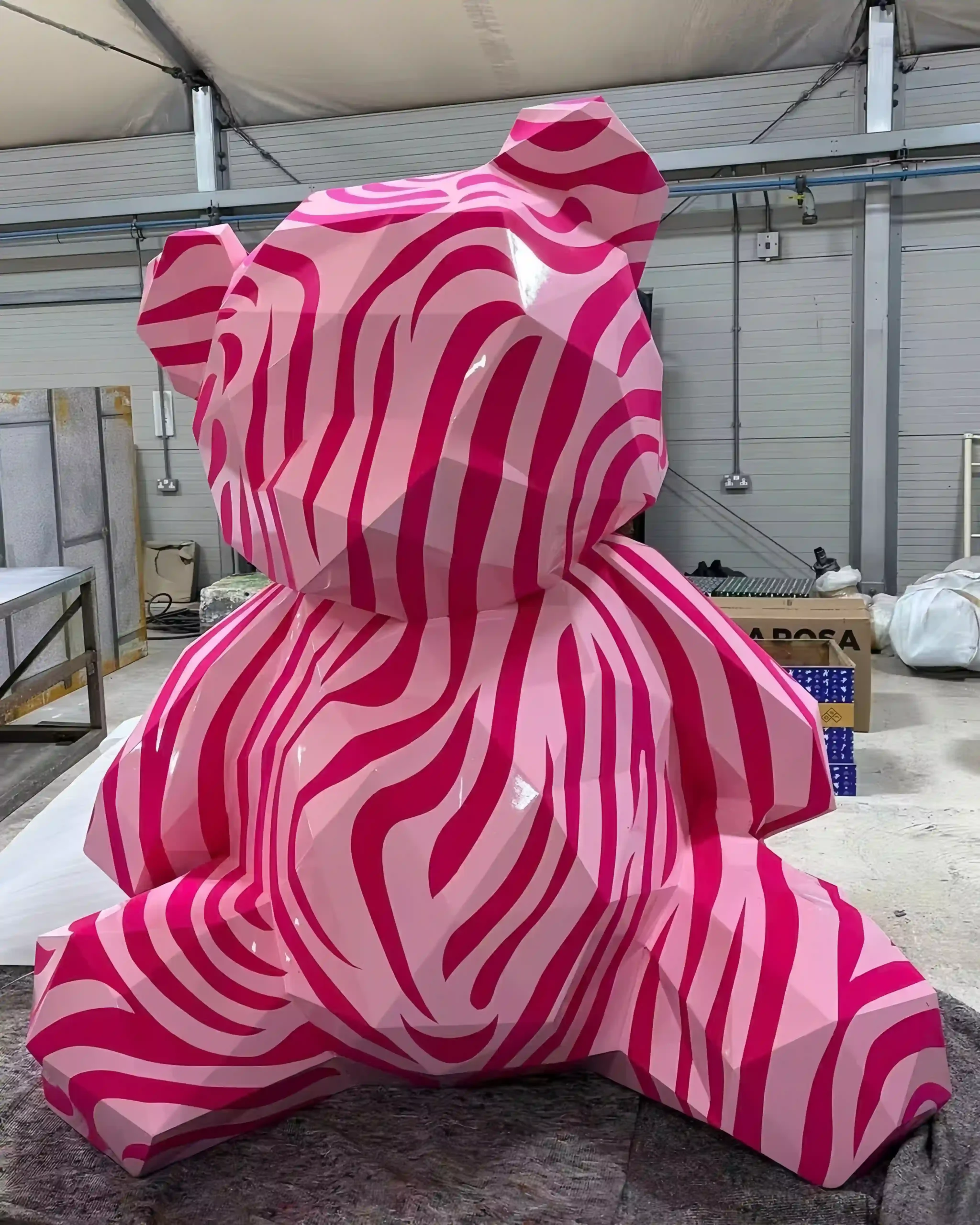 Pink striped fiberglass bear sculpture prop