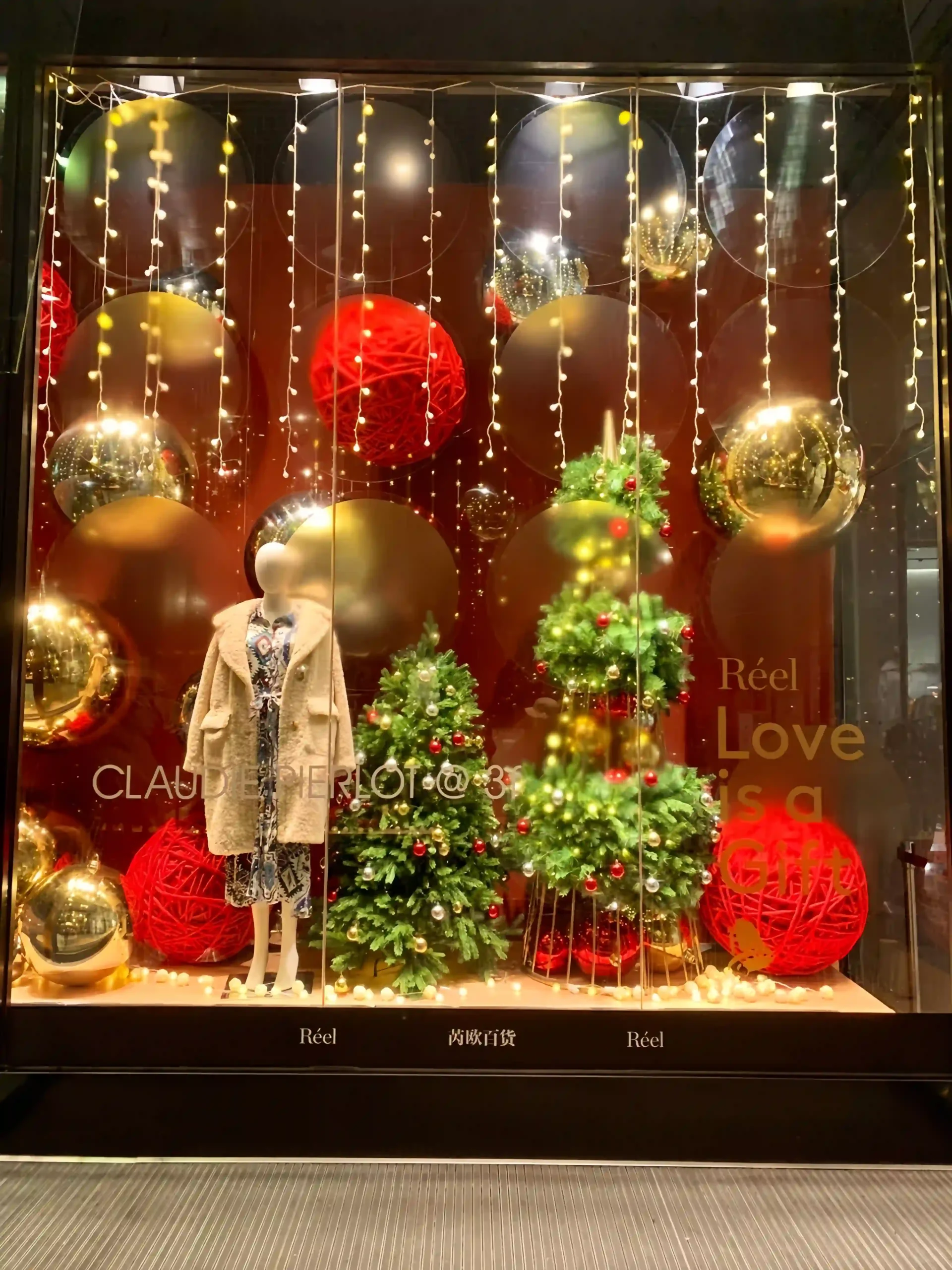 Elegant Christmas festive display for premium brand retail campaign