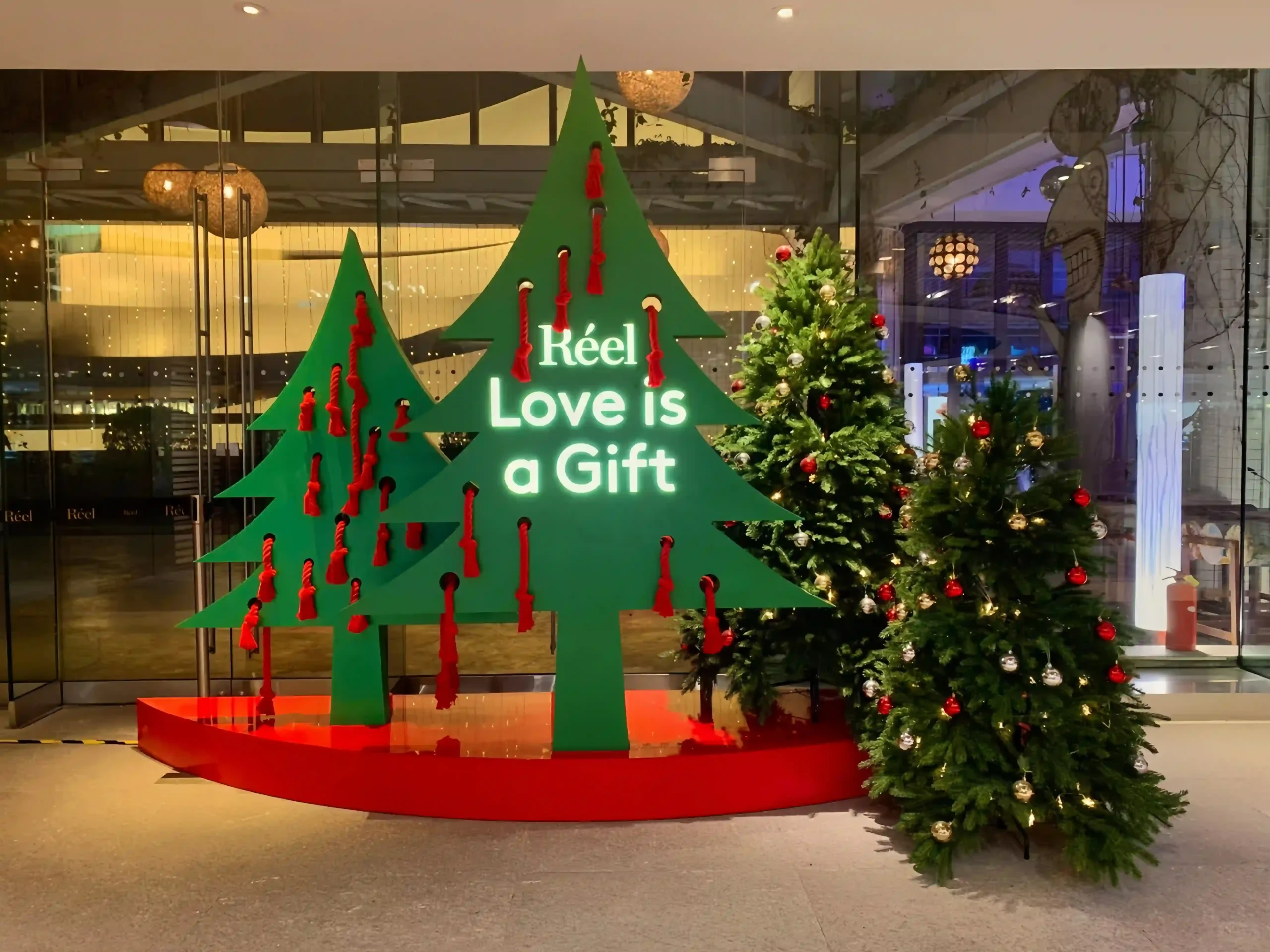 Modern Christmas festive display for apparel retail campaign