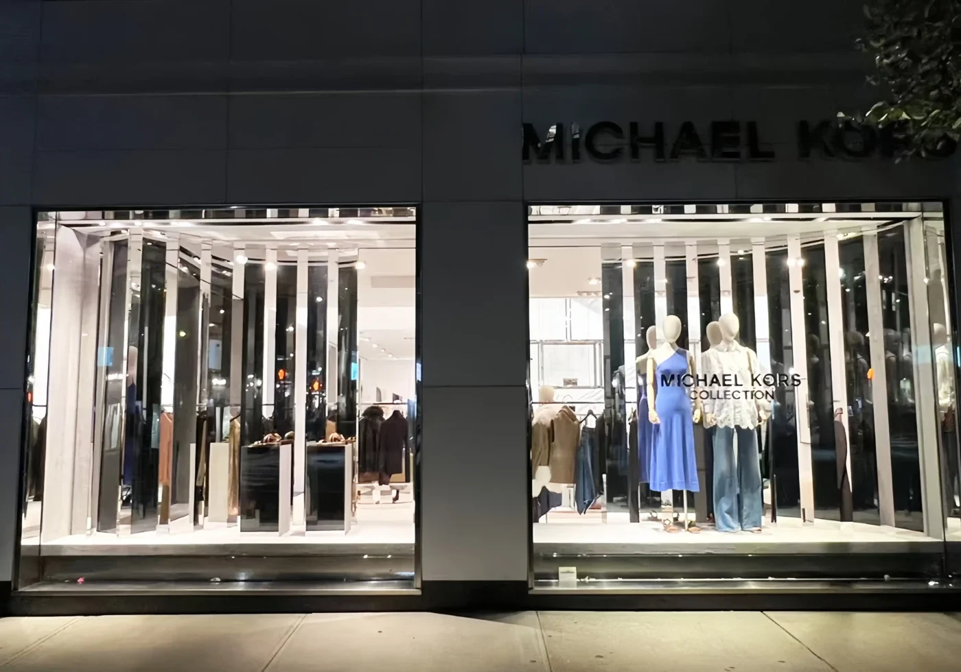 michael kors mirror polished stainless steel window display fixture