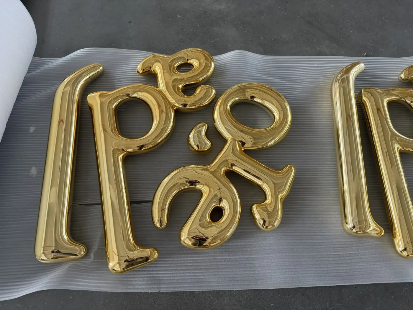 electroplated gold letters mirror finish detail