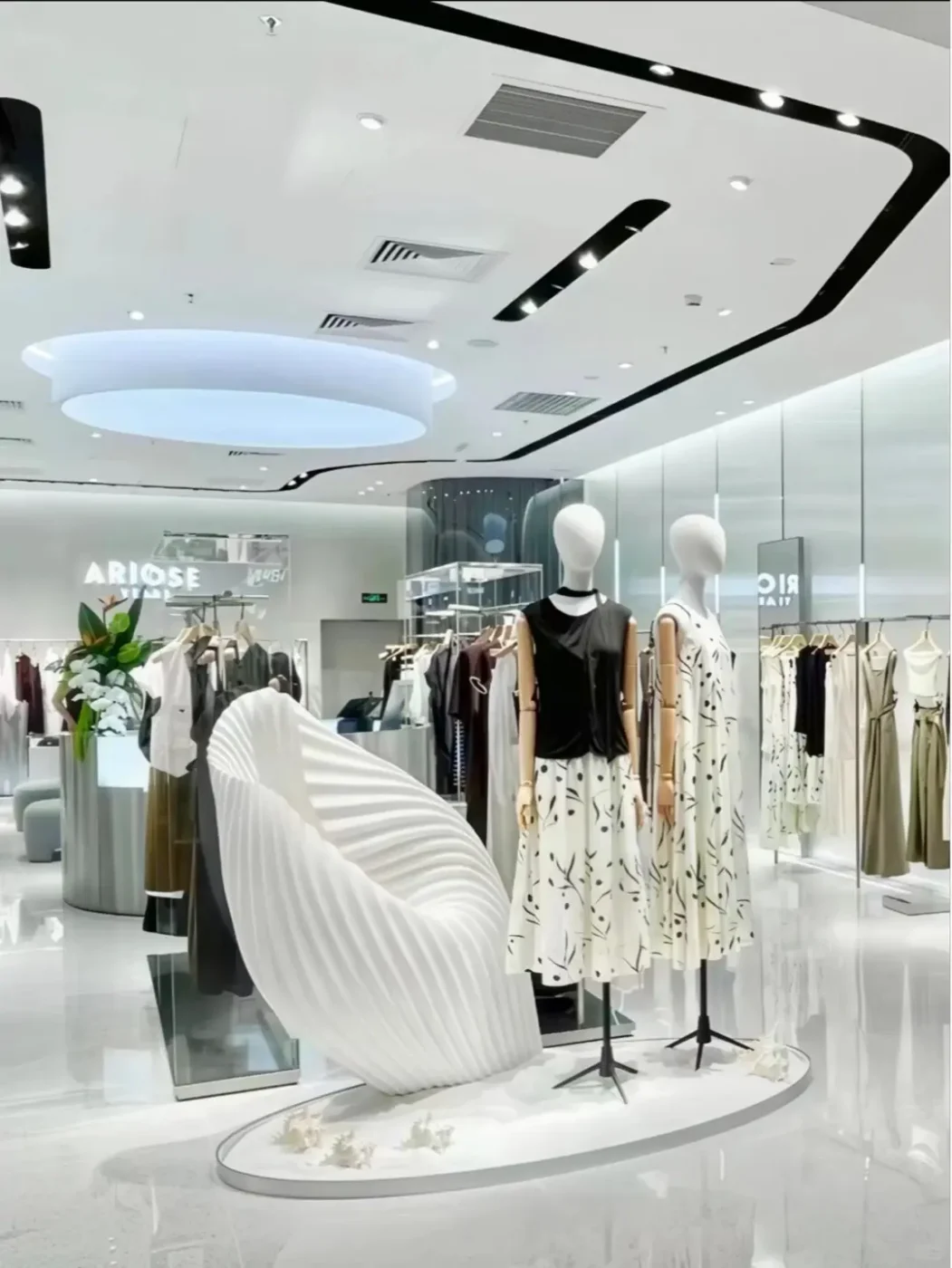 modern retail window display white futuristic fashion store design 05.jpg