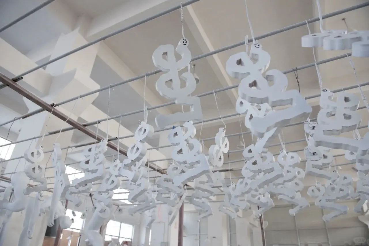 white hanging display props before finishing