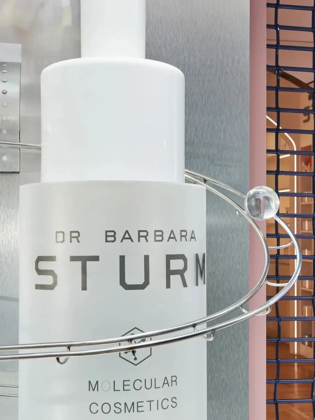 dr barbara sturm oversized bottle prop acrylic lettering