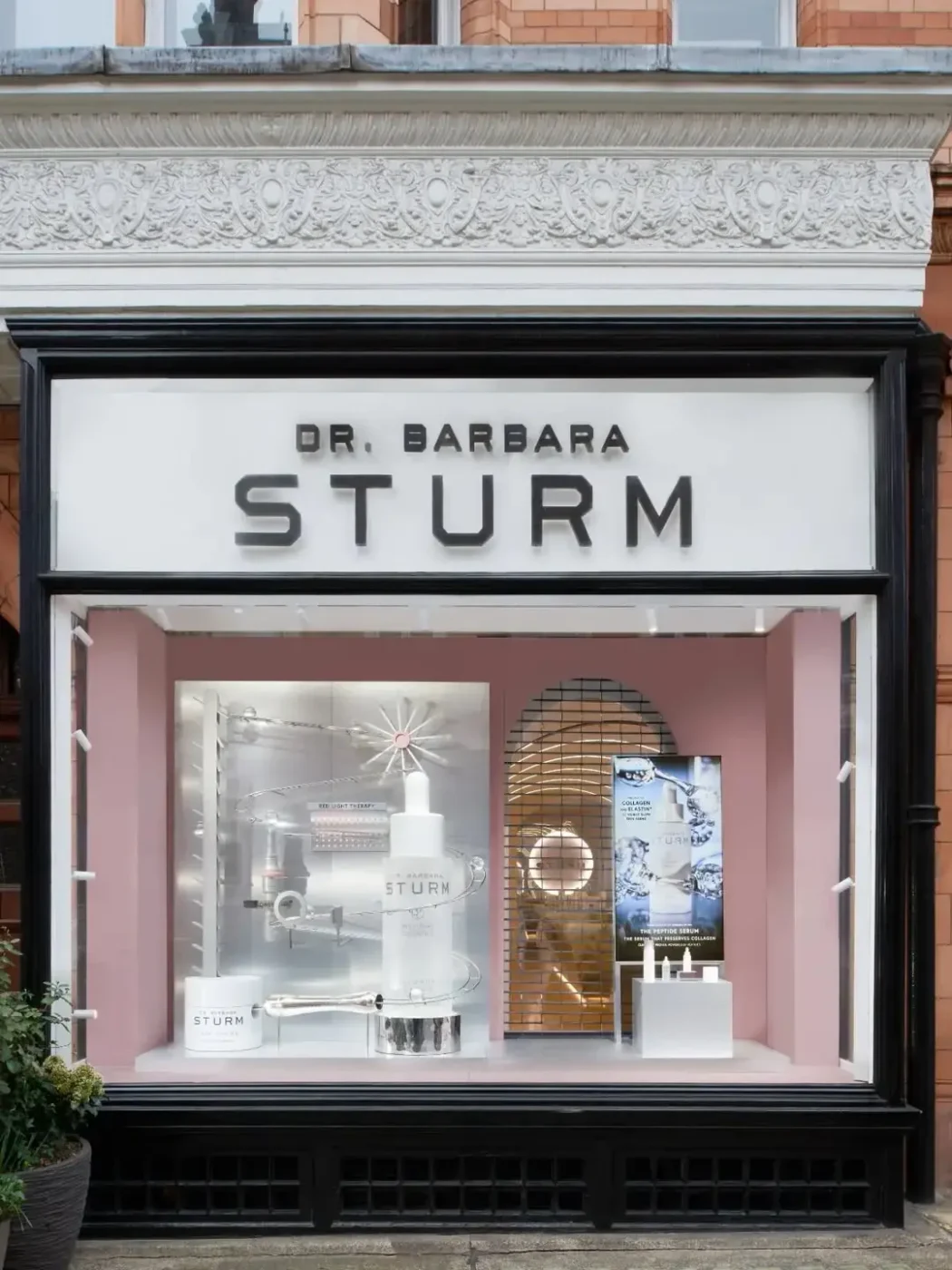 dr barbara sturm pink acrylic arch counter display unit