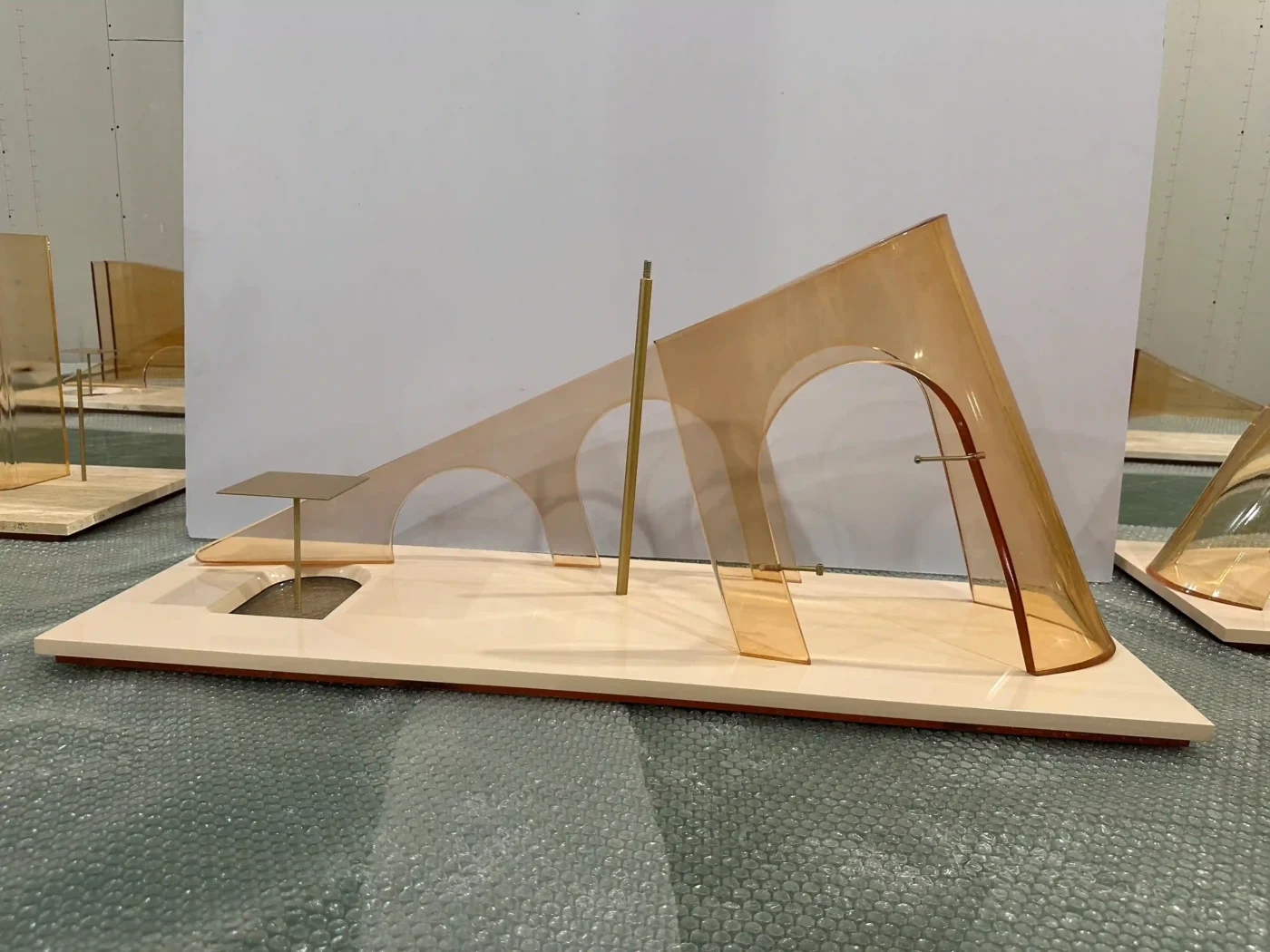 physical sample of a store window display prop during client approval review (2)