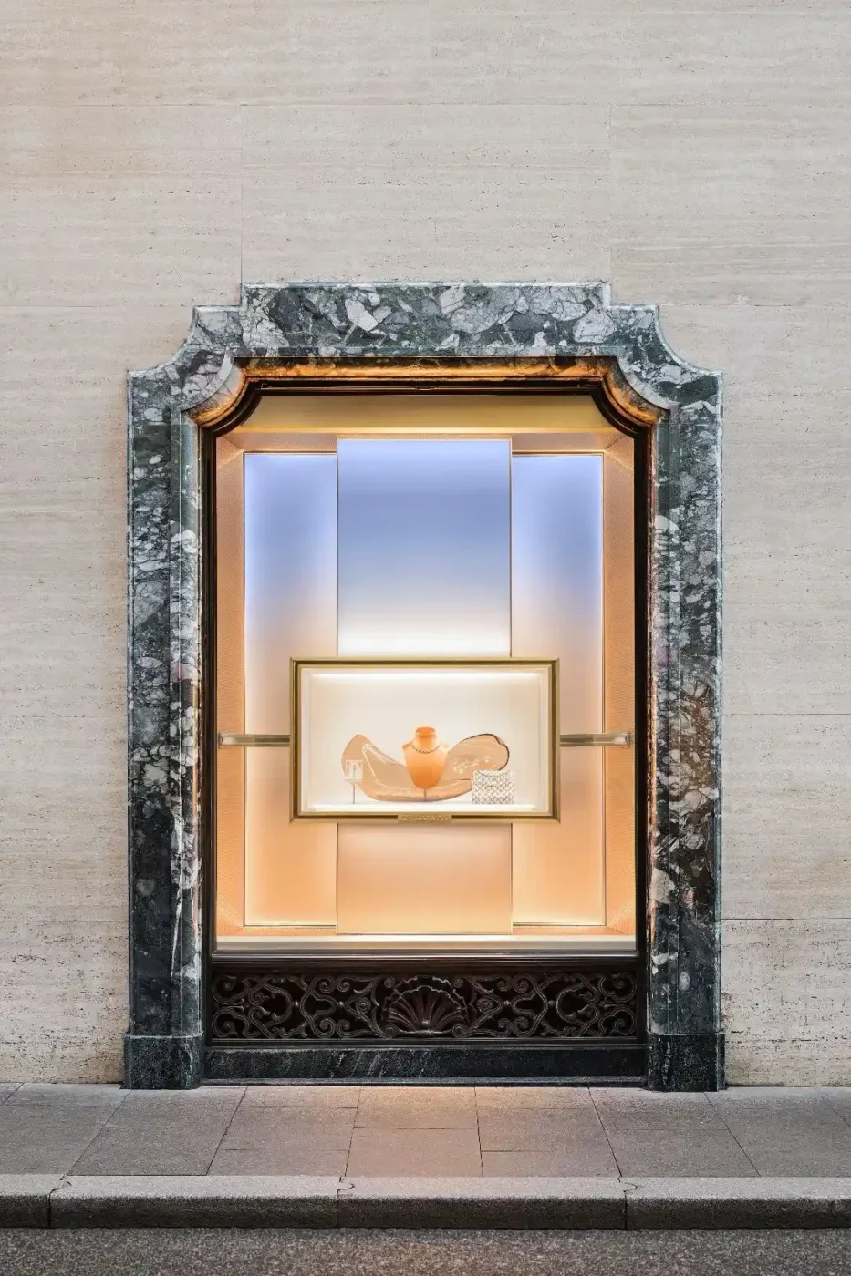 store window display viewed from street distance showing overall visual impact and lighting